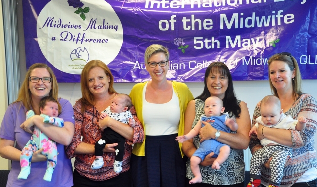 Image of midwife with mothers and babies