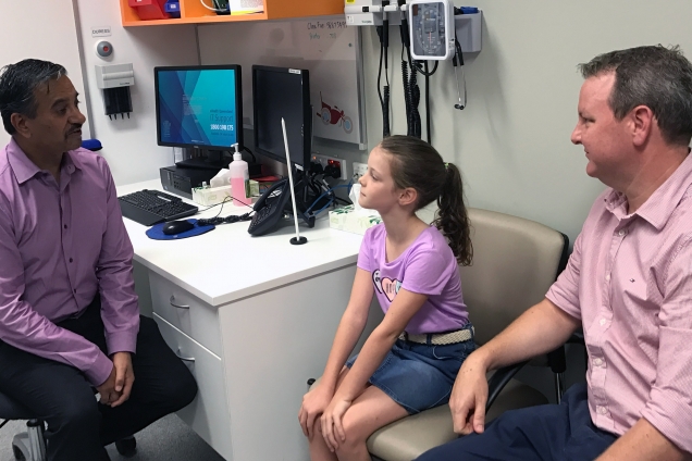 Paediatric Neurologist Dr Harry Singh with patient Sophie