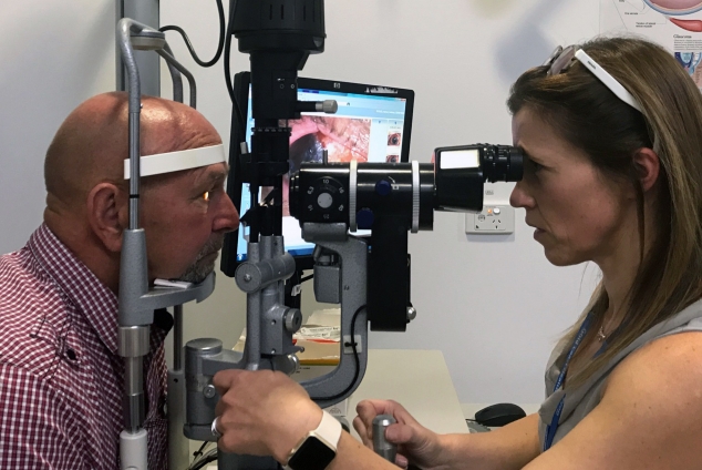 image of optician and patient