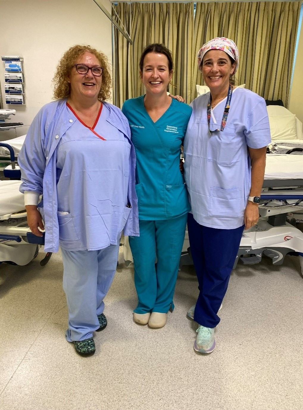 Caption: (L-R) Clinical Facilitator Helen Ashby, Clinical Nurse Amelia Robertson, and Registered Nurse Melissa Allen were part of the Varsity Lakes Day Hospital team that responded to the facility’s pivot to vulnerable patient care during the weather emergency. 