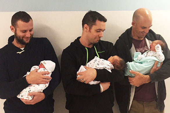 Proud new dads Sam Thompson (with Olivia), Todd Kennett (Olivia) and Kurt Walker (Aluna) and their bundles of joy born at GCUH