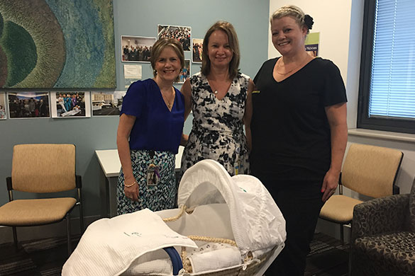 Perinatal Loss Coordinators Glenda Hondroudakis and Jo Everingham with Selena Wool who donated a cuddle cot to Gold Coast University Hospital. 