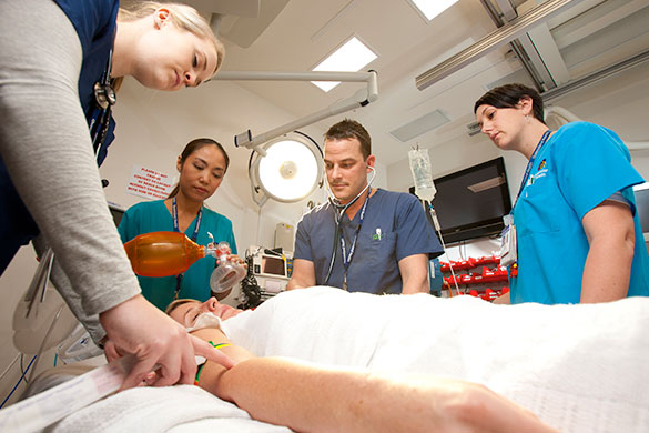 ED staff assess a patient at Gold Coast University Hospital ED staff assess a patient at Gold Coast University Hospital