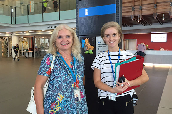 Maria Corbett, an interpreter fluent in Bosnian, Croatian, Hungarian, Serbian and English, with Interpreter Services Coordinator Jennifer Babin.