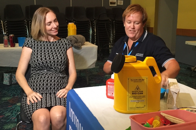 Expecting mum receiving the four-strain flu vaccination at Robina Library