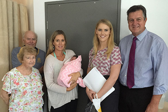 Val Heaton and Bob Curtis from Rotary Runaway Bay, mum Amanda Shutes with Ivy Rose, and Paradise Point Community Bank representatives Britt Van Mengersen and Ian Johnston 