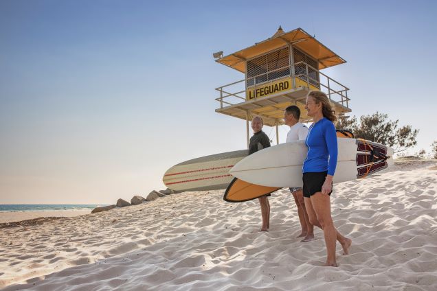 Group of surfers on the beach